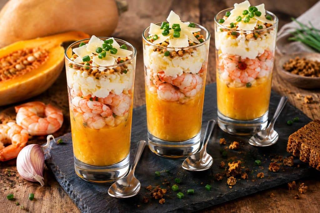 Verrines de butternut, crevettes et Grana Padano au pain d'épices : une recette gourmande